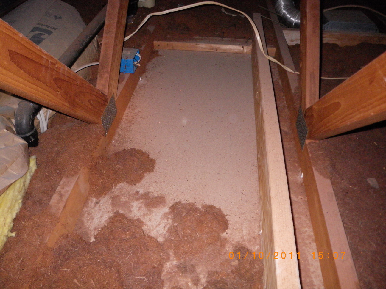 Frequently in attics we will find that someone working in the attic, either installing a new light fixture, a ceiling fan, or maybe some speakers, had to move the insulation out of the way, then forgot to put it back when they were done. Now there is a huge hole in the insulation that is allowing large amounts of heat to escape through your ceiling into your attic.